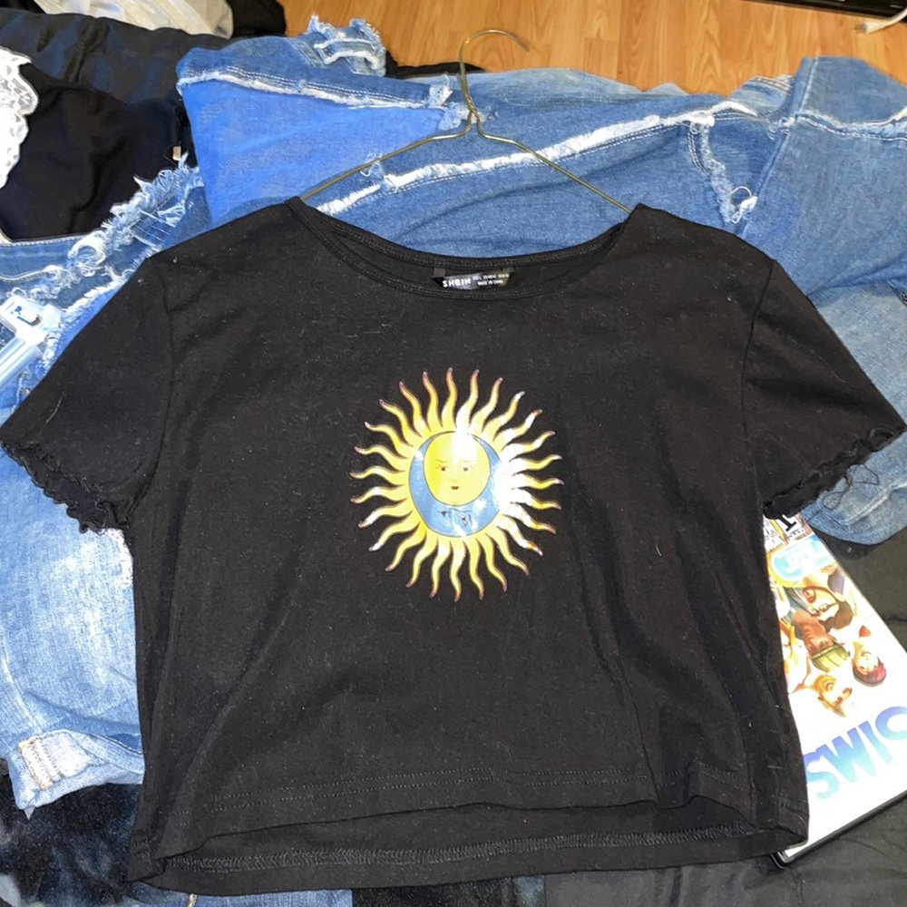 SHEIN Size Large. Crop top and the sticker is on good.